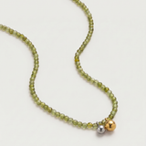 Olive green beaded necklace in gold, with green cubic zirconia beads and a two-tone pendant 