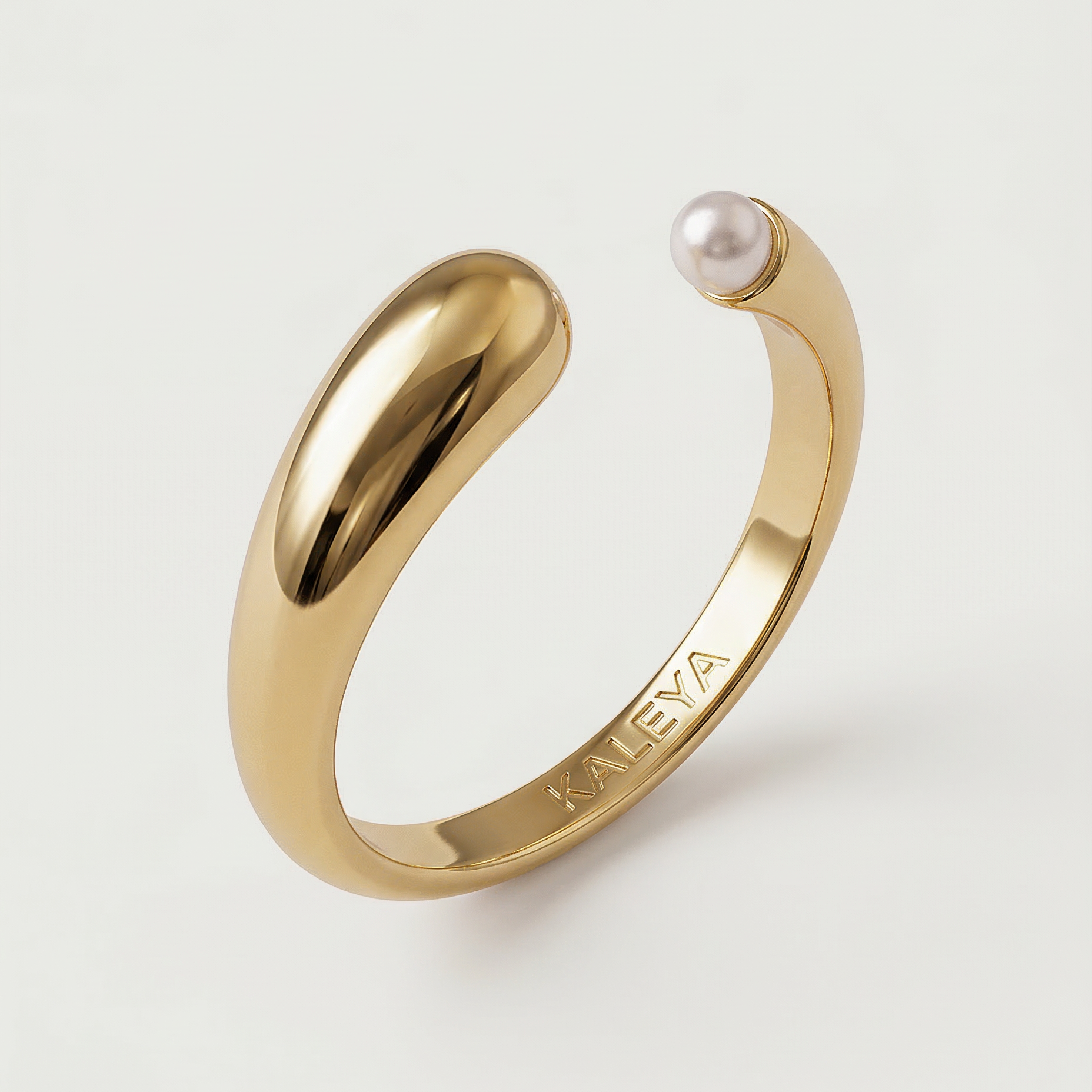 beautiful gold plated ring with small freshwater pearl