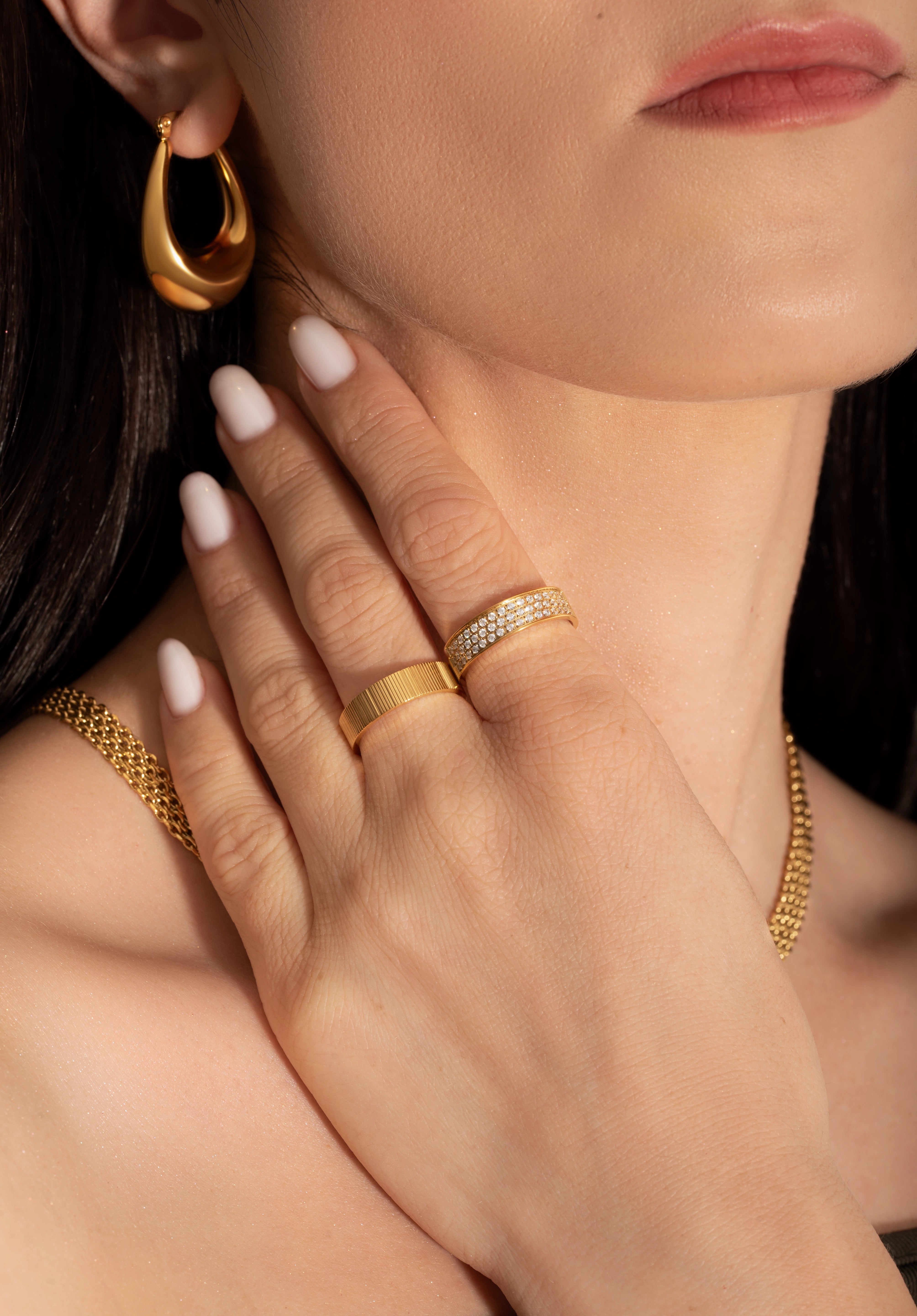 model wearing gold plated jewellery
