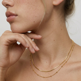 model wearing a delicate two layer gold plated 18k necklace