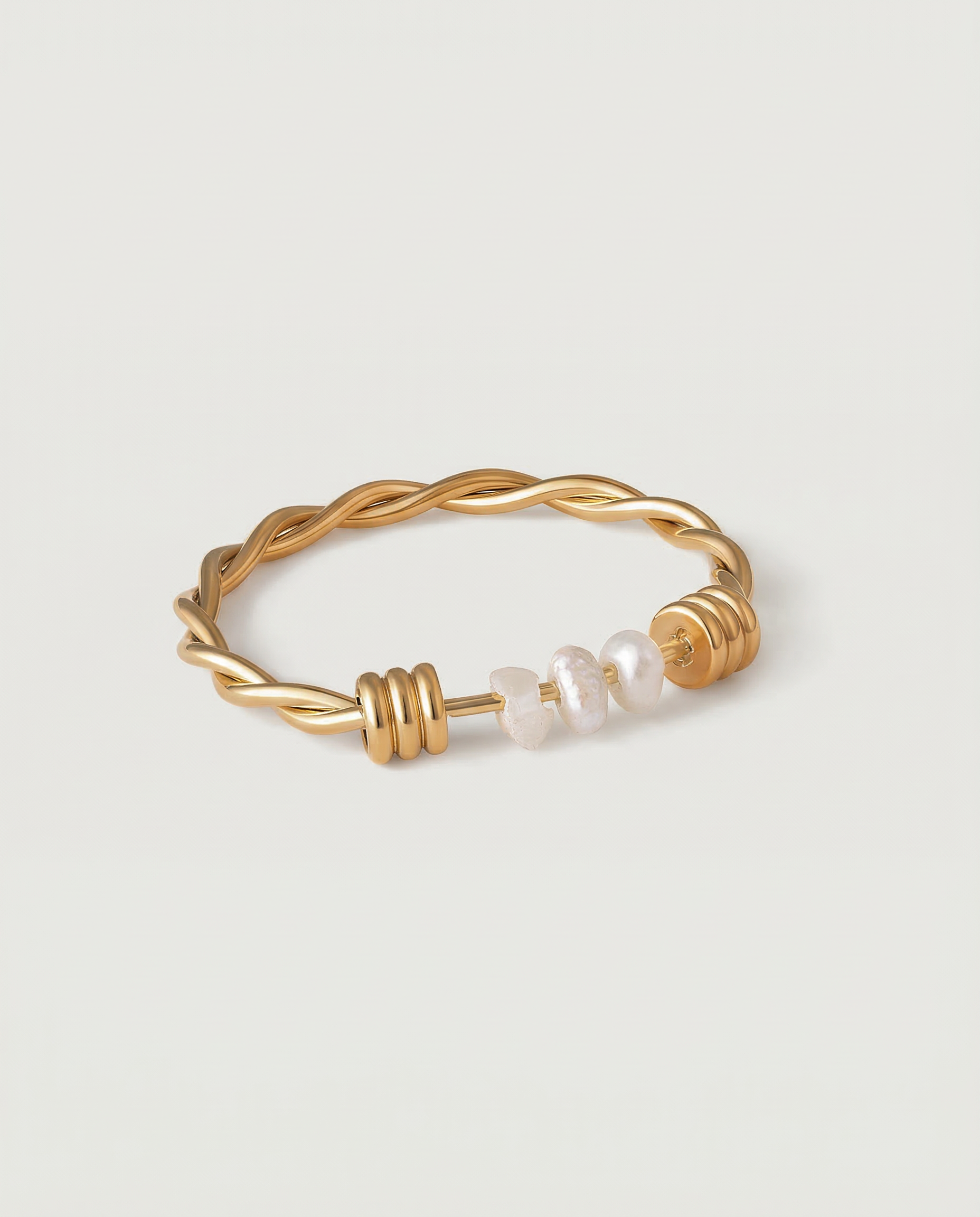 intertwined delicate gold plated ring with natural freshwater pearls