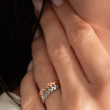 close up of a model wearing the zaria ring from Kaleya Studio in sterling silver and rose
