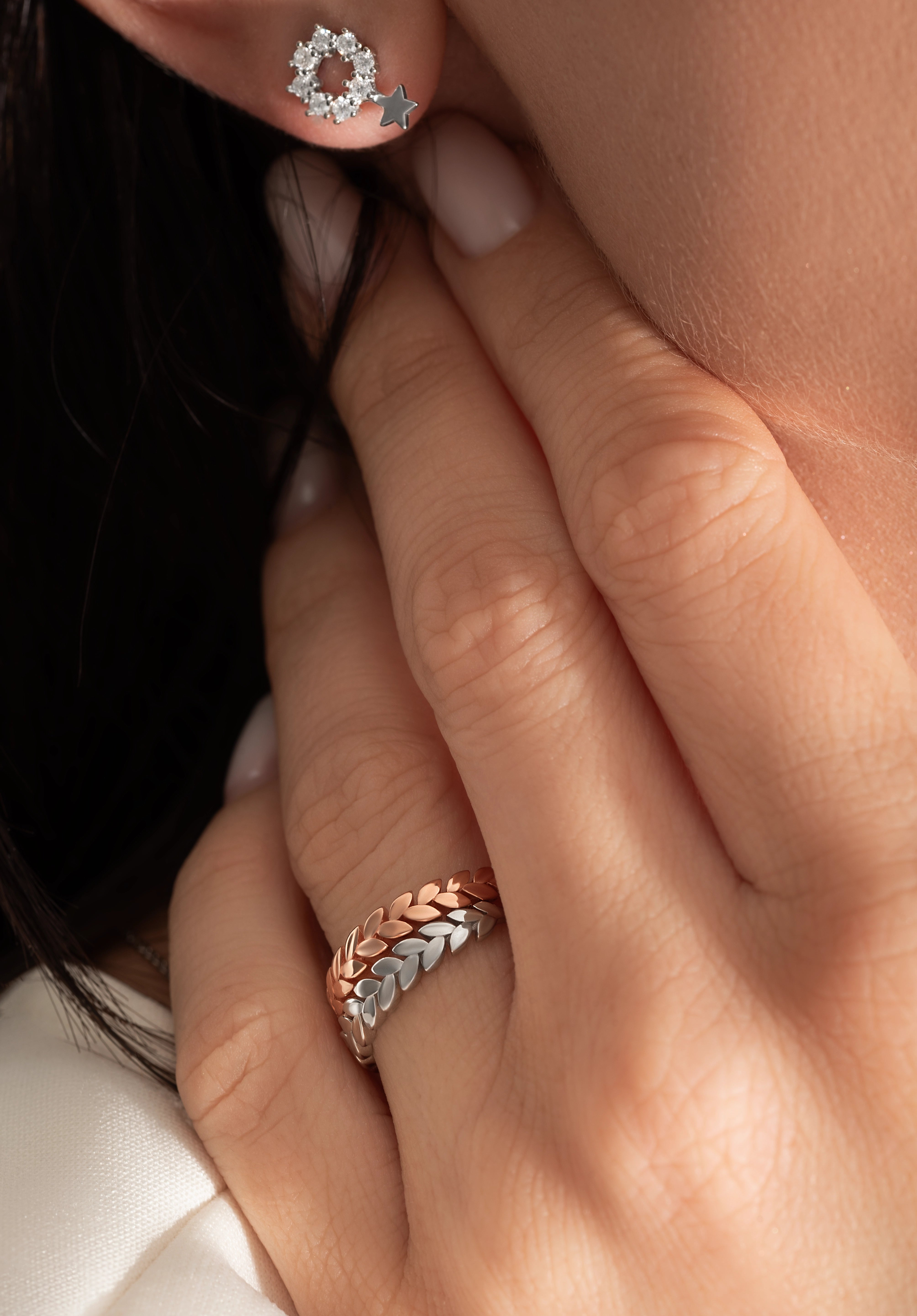 close up of a model wearing the zaria ring from Kaleya Studio in sterling silver and rose