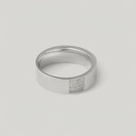 video showing a silver ring with a rectangular accent paved with sparkling cubic zirconia stones, by kaleya studio