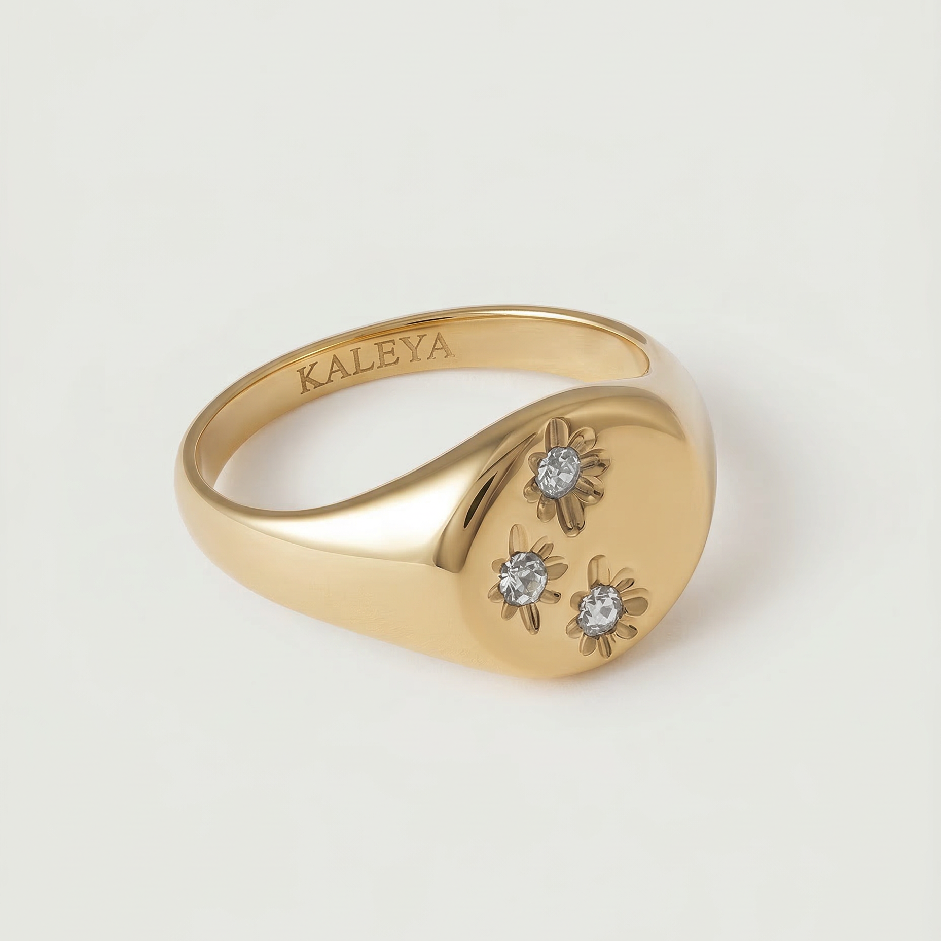signet ring with 3 crystals