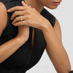female model wearing gold plated ring